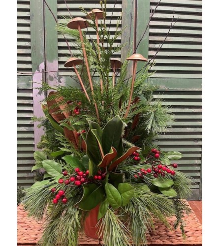 Outdoor Winter Greenery Arrangement. An arrangement by Forest Florist.