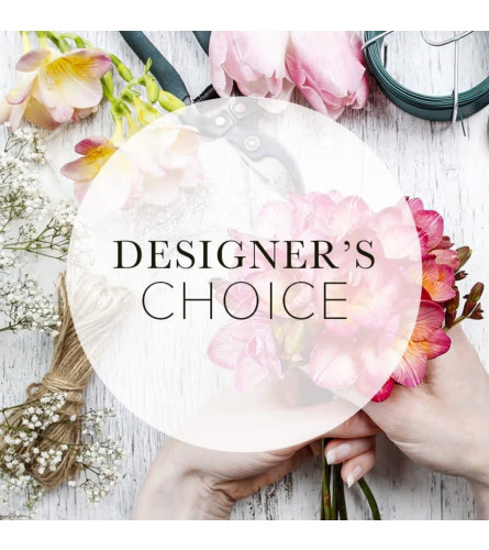 #1 Designer Choice - Deluxe. An arrangement by Blossy Flowers.