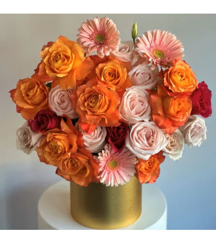#11 Sunset - Deluxe. An arrangement by Blossy Flowers.