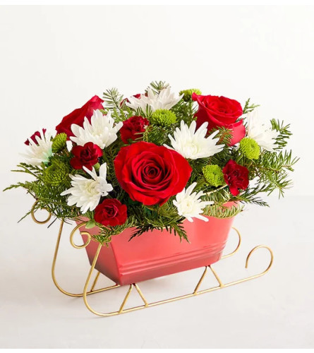 DASHING THROUGH THE SNOW - Deluxe. An arrangement by J.D. Ballantine's Flowers and Gifts.