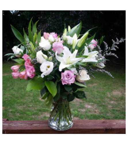 Simple Elegance - Deluxe. An arrangement by Avenue Florist.