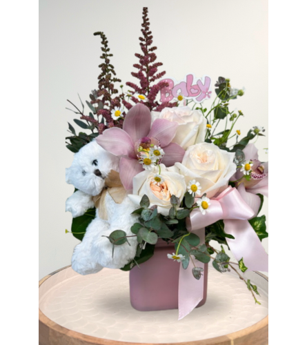 Beary Cute Baby Girl. An arrangement by Blossoms On The Trail.