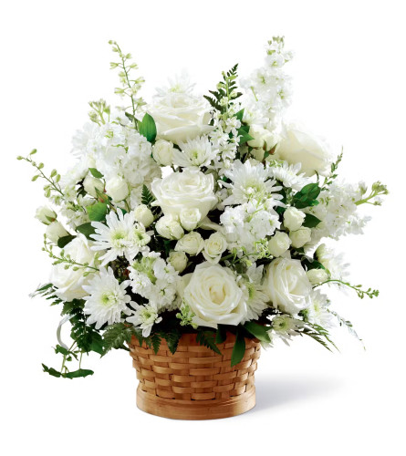 Heartfelt Condolences Basket. An arrangement by Flowers and Beyond.