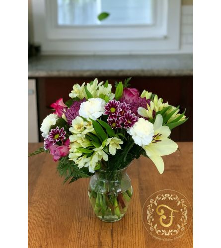 Blooming with Love Arrangement - Deluxe. An arrangement by Lori's Hearts and Flowers.