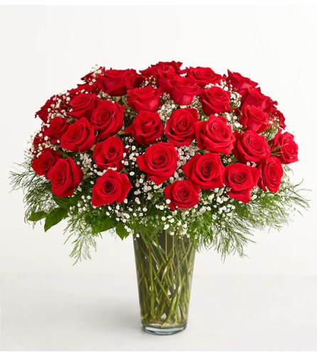 Ultimate Elegance Long Stem Roses - Deluxe. An arrangement by Aventura Blooming Petals.