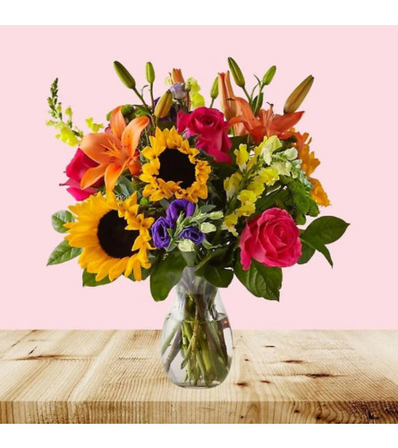 Sunshine Bliss Bouquet. An arrangement by Aventura Blooming Petals.