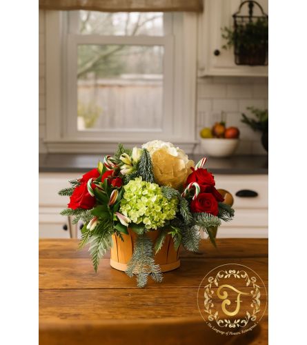 Holiday Happiness Basket. An arrangement by Anderson Flowers.