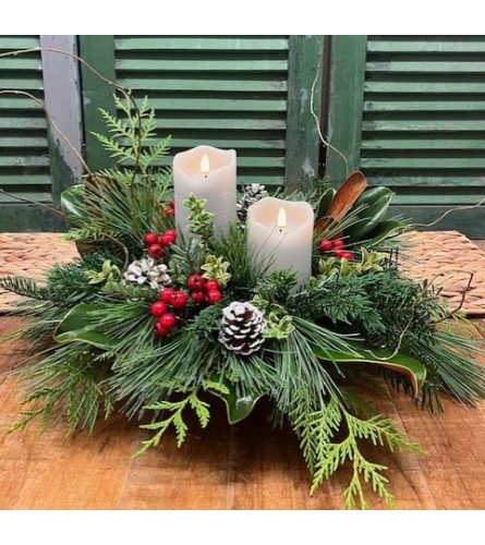 Winter Whispers Candlelight Bouquet. An arrangement by Forest Florist.