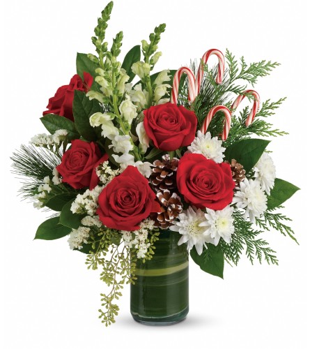 Teleflora's Festive Pines Bouquet - Deluxe. An arrangement by Very's Flowers.
