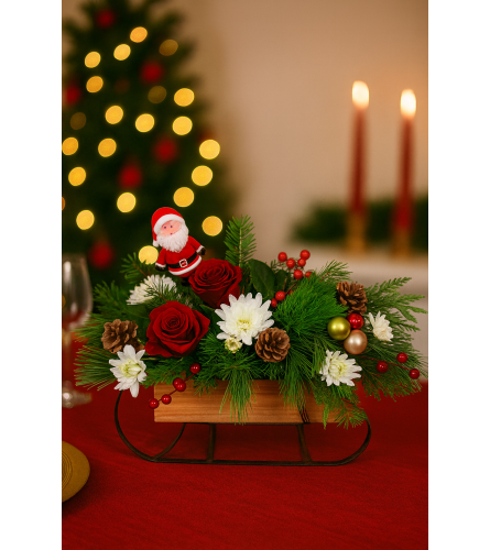 Jolly Sleigh Centrepiece - Deluxe. An arrangement by In Bloom.