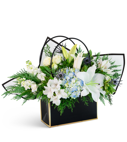 Celestial Dreams Tote. An arrangement by The Flower Shop of Lake Charles.