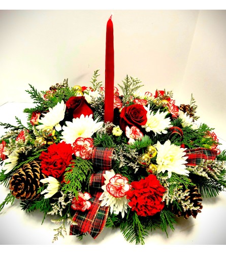 Deluxe Centerpiece. An arrangement by Brown Floral and Fudge.