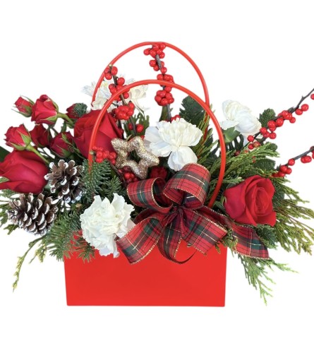 Christmas Cute Bag. An arrangement by Azi Flowers.