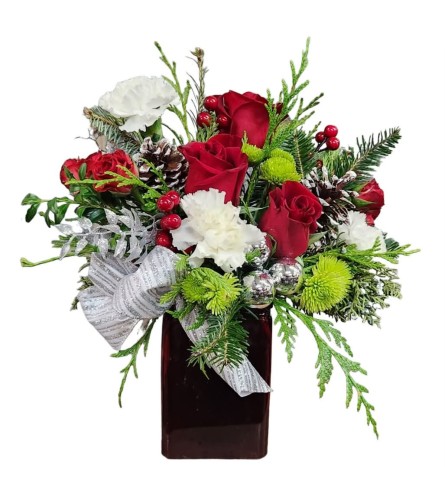 Season's Surprise. An arrangement by Azi Flowers.