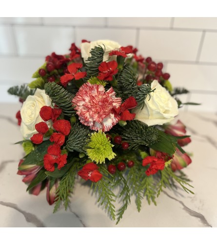Christmas centerpiece. An arrangement by Brookdale Flowers and Gifts.
