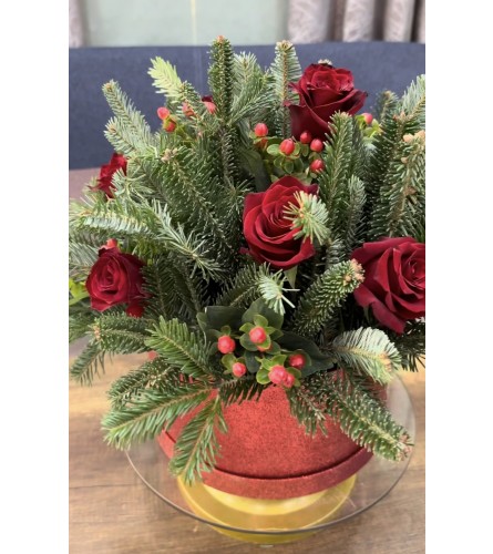 Christmas Rose Harmony Special. An arrangement by Geni's Florist and Gifts.