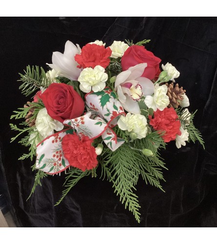 Orchid Delight. An arrangement by Roma Flowers and Gifts.