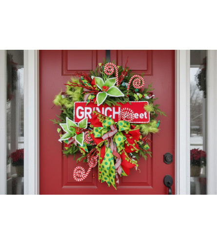 A Little Bit Grinchy Wreath. An arrangement by Flower Snobs at Cityview.