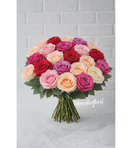 Simply Roses (Pinks, Purple, Blush and Red) - Deluxe. An arrangement by Brooklin Floral and Garden Shoppe Inc..