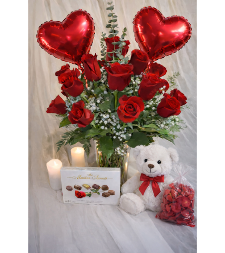 Big Love Surprise Package. An arrangement by Creations de Belle.
