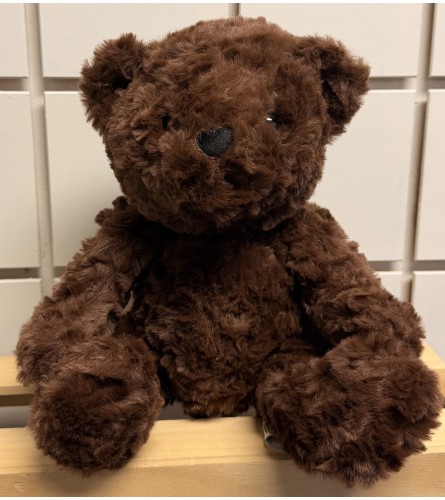 Cuddly Teddy Bear. An arrangement by Rustic Floral and Gifts.