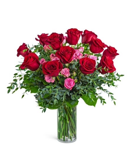Kiss Me Dozen Roses. An arrangement by The Flower Shop of Lake Charles.
