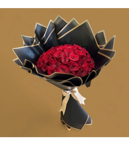 Luxury 24 Red Roses Bouquet. An arrangement by Cantutas Florist.