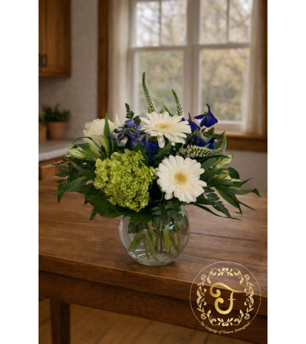 Quiet Remembrance. An arrangement by Roma James Gifts.