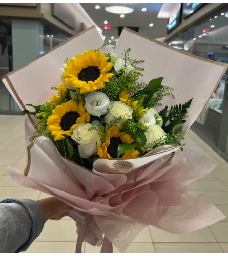 Sunlit Serenity Charm. An arrangement by Petals.