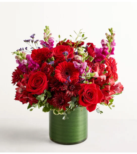 Vivid Devotion - Deluxe. An arrangement by Garden Florist.