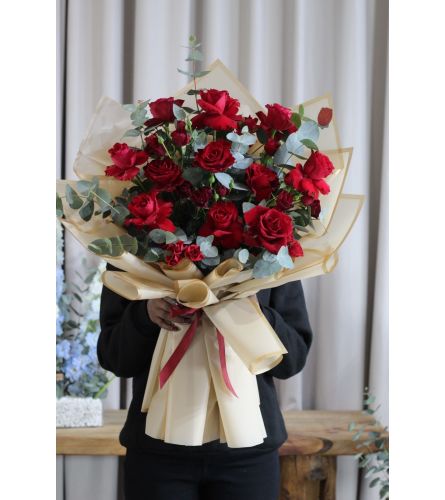 European Style Love Wrap. An arrangement by New Britain Flower Shop.