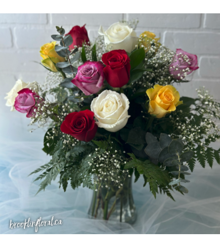 Mixed Coloured Dozen Roses - Standard. An arrangement by Brooklin Floral and Garden Shoppe Inc..