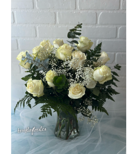 White Dozen Roses - Standard. An arrangement by Brooklin Floral and Garden Shoppe Inc..