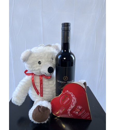 ADD : Bear, Wine and Chocolates. An arrangement by Aurora Greenhouse.