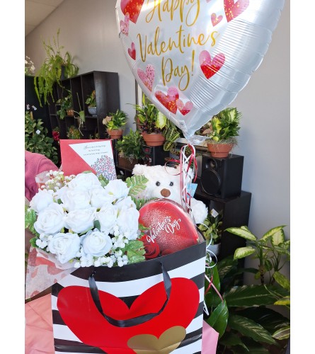 Valentine's Day Bundle Bag. An arrangement by Palmetto Blossom.