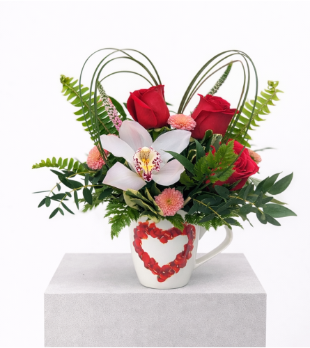 Love in a Mug. An arrangement by The Garden Gate Gifts and Florals.