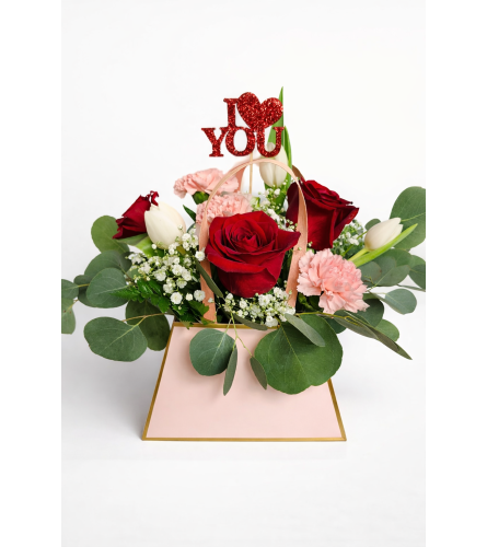 Love Letter. An arrangement by A Lily's Dew Drop Flower Shop.