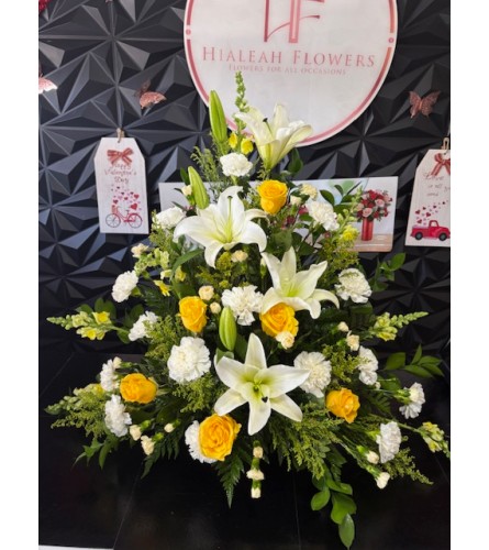 Sunshine and Serenity. An arrangement by Hialeah Flowers.
