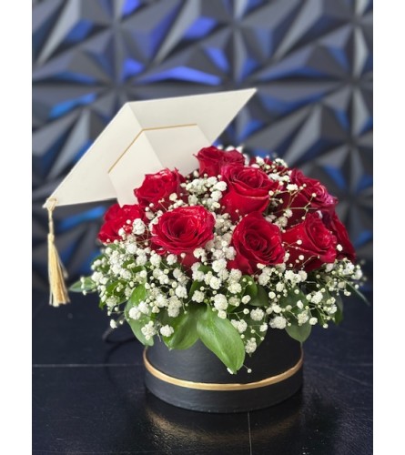 Crimson Dreams Bouquet. An arrangement by Hialeah Flowers.