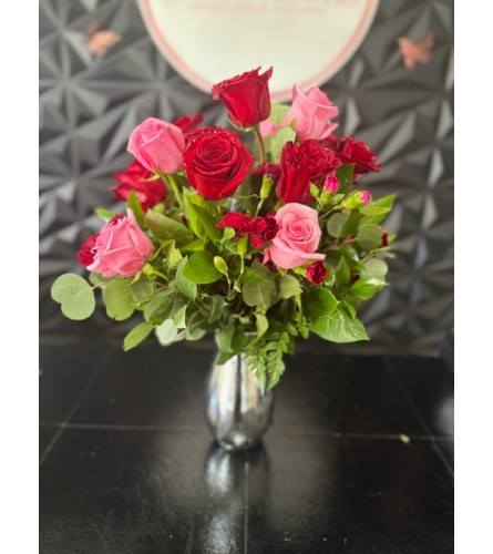 Romance in Bloom. An arrangement by Hialeah Flowers.