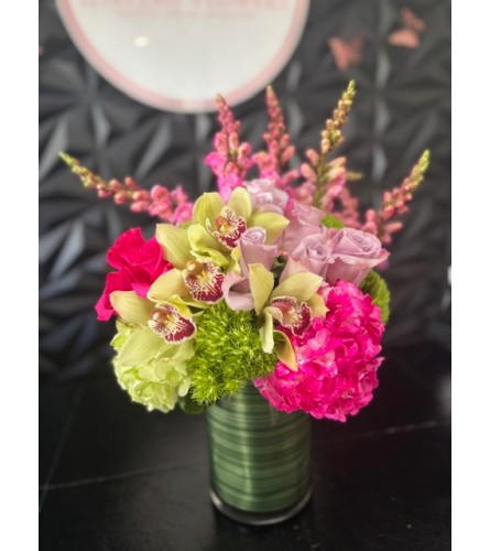 Orchid Kiss Garden. An arrangement by Hialeah Flowers.