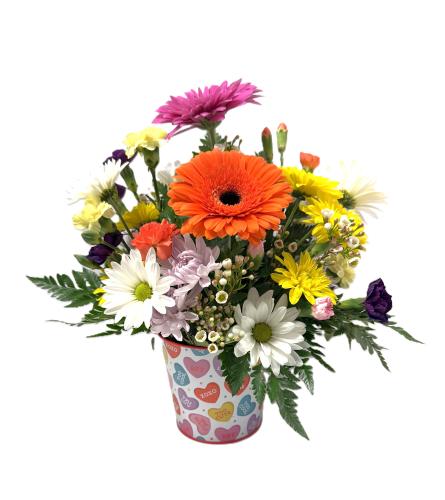 Cupid's Charm. An arrangement by Brown Floral and Fudge.