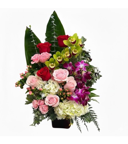 Crimson Orchid Elegance - Deluxe. An arrangement by Flowers by Peter.