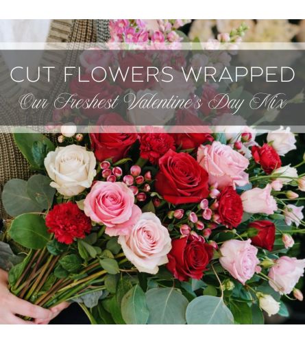 Cut Flowers Wrapped. An arrangement by The Greenhouse Florist.