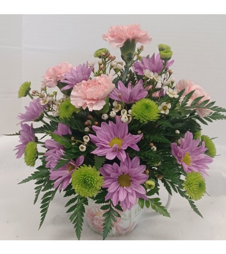 Carol Ann. An arrangement by Zaisers Florist and Greenhouse.
