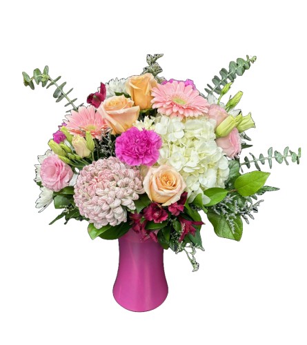 Blushing Devotion. An arrangement by Fendley Florists.