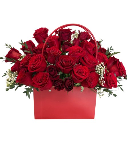 Rosy Whisper. An arrangement by Azi Flowers.