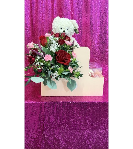 Nothing Bundt Blooms Package. An arrangement by Tangled Lilac Flowers and Gifts.