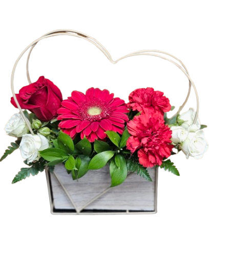 Heartfelt Blooms. An arrangement by Harriet's Flower and Gift Shop.