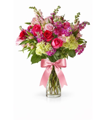 Mixed Love - Deluxe. An arrangement by Geni's Florist and Gifts.
